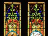 Large art glass window in need of restoration at St. Paul AME Church in Raleigh. WCHS adopted the panel on the right for restoration.