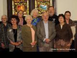 WCHS Board members in front of the window adopted by the Society for restoration at the Open House at St. Paul AME Church, Raleigh NC--February 2017